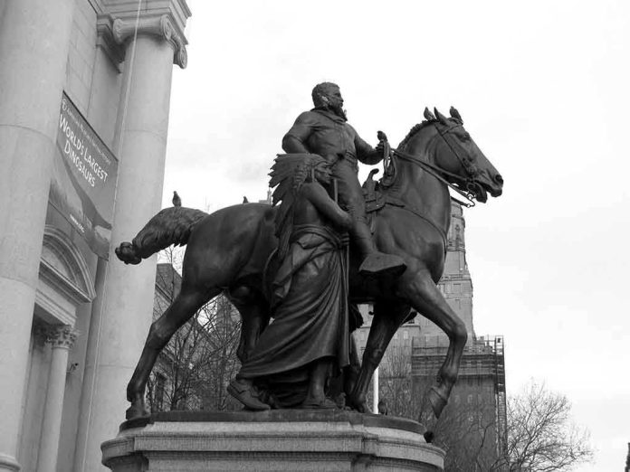Bronze equestrian statue of a historical figure with a woman beside him