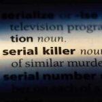 Dictionary definition of serial killer highlighted