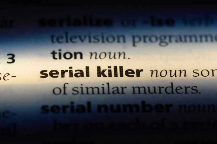 1155420268 Dictionary definition of serial killer highlighted