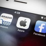Amazon Apple Facebook apps on smartphone screen