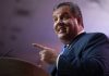 Chris Christie Issues WARNING to Trump! A man in a suit passionately speaking at a podium