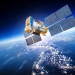 Cosmic Mystery SOLVED After 17 Years A satellite equipped with solar panels orbiting above the Earth