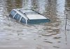 Baby Car Seat SLIDES Across Raging Floods A partially submerged vehicle in floodwaters