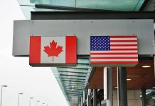 Trump CUTS Canada Loose—MASSIVE Power Move Canadian and American flags displayed at a border crossing