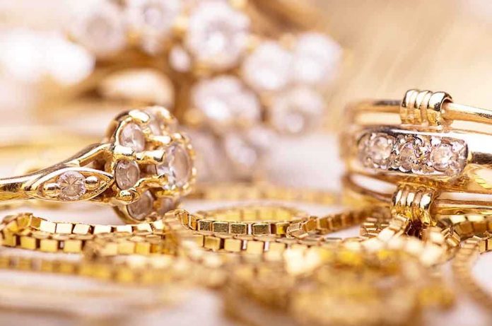 shutterstock_225498538.jpg Close-up of various gold rings adorned with sparkling gems