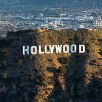 $110B Hollywood Mega-Merger Sparks Panic The Hollywood sign on a hillside.