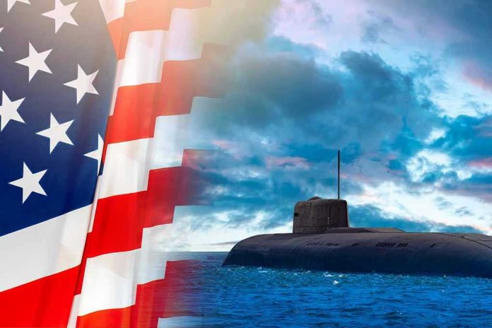 2068617785 American flag and submarine at sea under a cloudy sky.