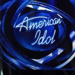 American Idol Star CHARGED — Wife Dead American Idol logo illuminated in blue lights on stage