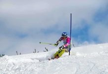 Football Field Avalanche DESTROYS Expert Ski Group Athlete skiing down a snowy slope around a slalom pole