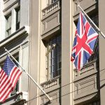 American and British flags displayed on a building