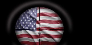View of the American flag through a sniper scope