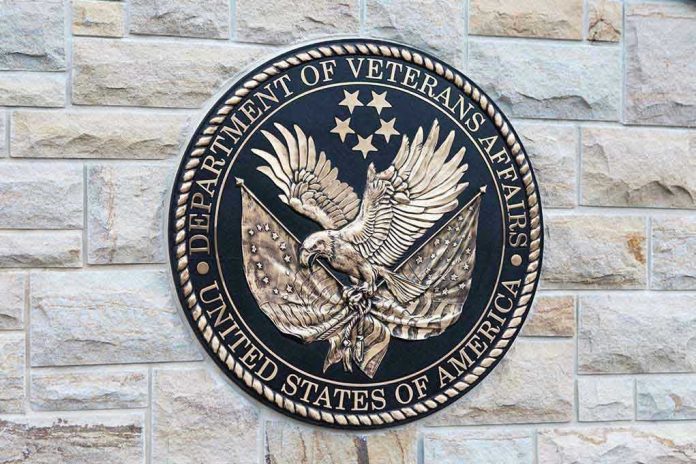 Department of Veterans Affairs seal on brick wall.