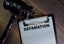 Tarot Star DESTROYED – $10M Defamation Verdict Gavel and clipboard with Defamation text.