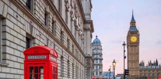 HALF-MILLION March Jams Central London Red telephone booth near Big Ben in London.