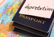 Chicken Nugget Defense HALTS Deportation Stack of passports with a note labeled deportation on top, placed on a map