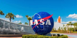 Thousands of Planets VANISHED — Astronomers Know Why NASA logo sculpture with spaceship and palm trees.
