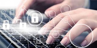 Hands typing with cybersecurity icons overlay.