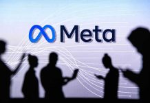 People silhouetted against Meta logo background.