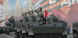 Staggering 1.2M Russian Casualties EXPOSED Tanks with military personnel in street parade formation.