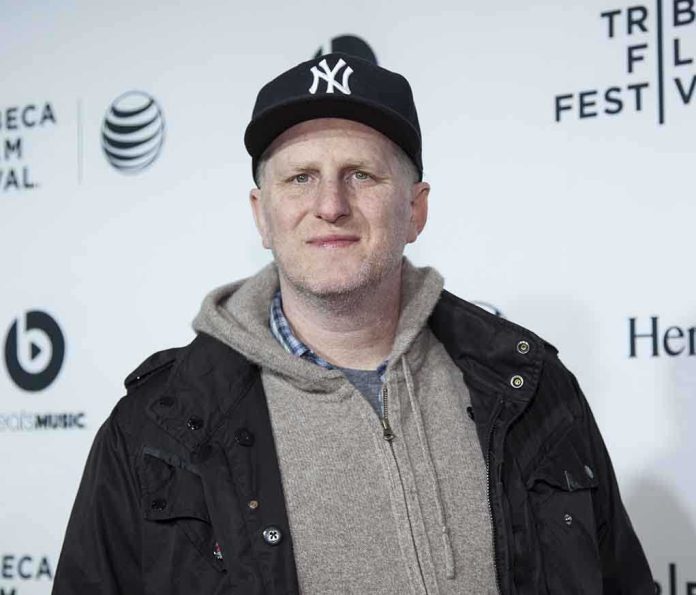 shutterstock_187679672.jpg Man wearing a New York Yankees cap and casual clothing at a film festival