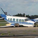 Raúl Castro’s Dark Past Resurfaces—Indictment Looms! Damaged blue and white small airplane on an airport runway