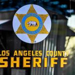 Los Angeles County Sheriff signage with badge.