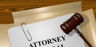 Attorney General document with gavel on desk.