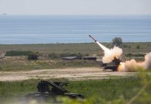Surface-to-air missile launching from a coastal battery
