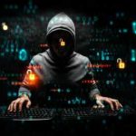 Hacker in hoodie surrounded by digital symbols and locks.