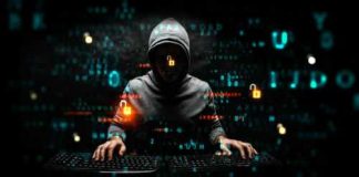 Hacker in hoodie surrounded by digital symbols and locks.