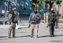 Law enforcement officers in tactical gear during an operation
