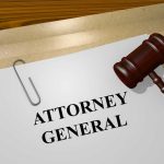 Attorney General document with gavel on desk.