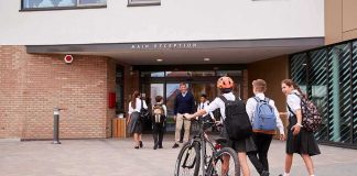 Obama-Appointed Judge Drops Title IX Bomb Students in uniforms arriving at a school entrance