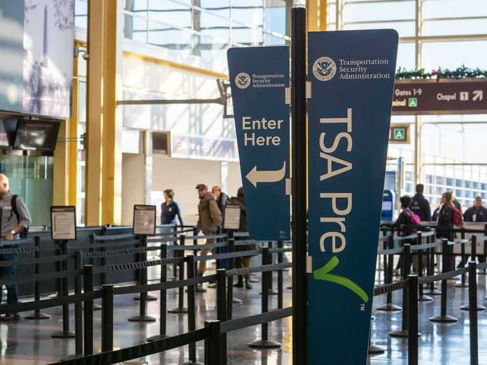 shutterstock_1549154468 TSA PreCheck sign at airport security