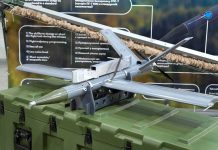 small military drone displayed on a green equipment case