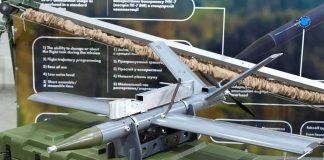 Iran Drone Kills U.S. Dad — After It’s Down small military drone displayed on a green equipment case