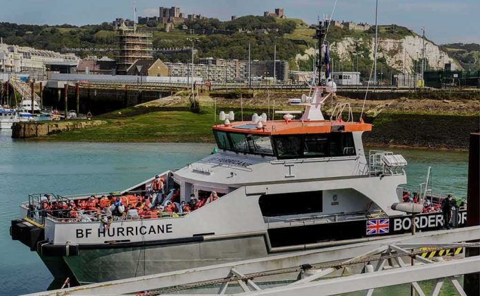 Border Force patrol boat BF Hurricane docked in a harbor
