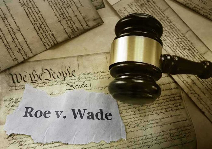 Judge's gavel on U.S. Constitution with Roe v. Wade note