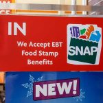 Welfare Shock: Refugees Cut Off store door sign indicating EBT SNAP acceptance