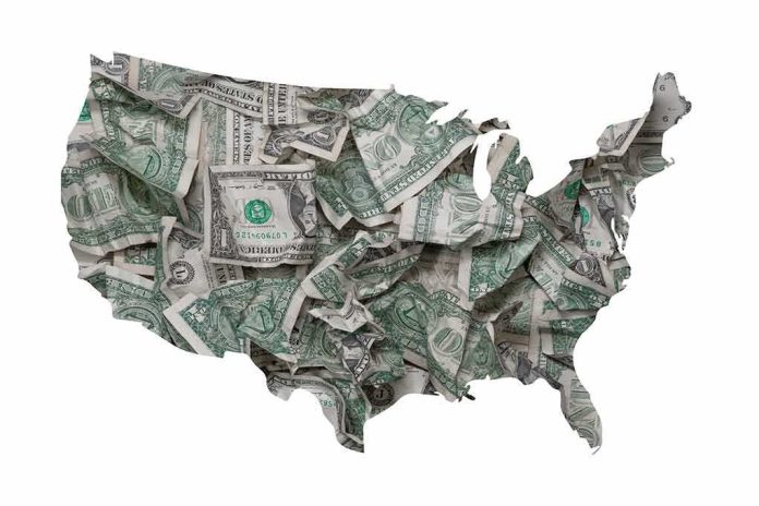 Map of the United States filled with crumpled US dollar bills