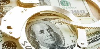 Iranian Airlines Just Lost a Major Destination Handcuffs on U.S. hundred-dollar bills
