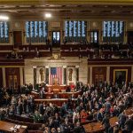 U.S. House chamber with lawmakers gathered on the floor
