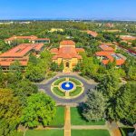 Turning Point Going Back to Where Charlie Kirk Was Shot Aerial view of a university campus with central fountain and red-tiled buildings