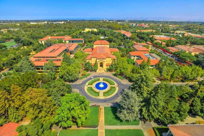 Aerial view of a university campus with central fountain and red-tiled buildings