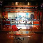 CNN studio set with empty anchor desk and red chair