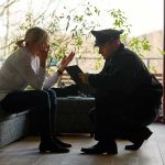 Amy Acton Just Got Called Out Over Comments About Vivek Ramaswamy and Texas police officer speaking with distressed woman on a sofa
