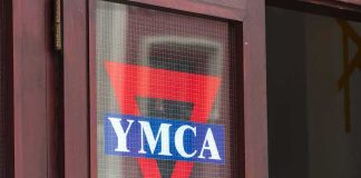 YMCA logo on a glass door