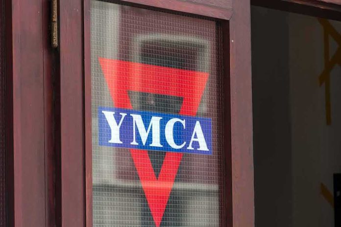 YMCA logo on a glass door