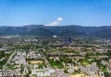 Cityscape with mountains in the background
