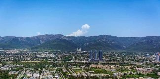 Saudi Arabia’s Enemies Are CLOSING IN Cityscape with mountains in the background